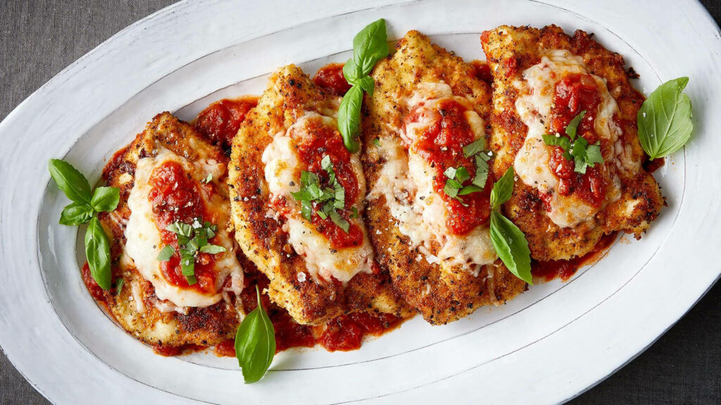 Delicious Chicken Parmigiana Wallpaper: Crispy, Cheesy & Flavorful