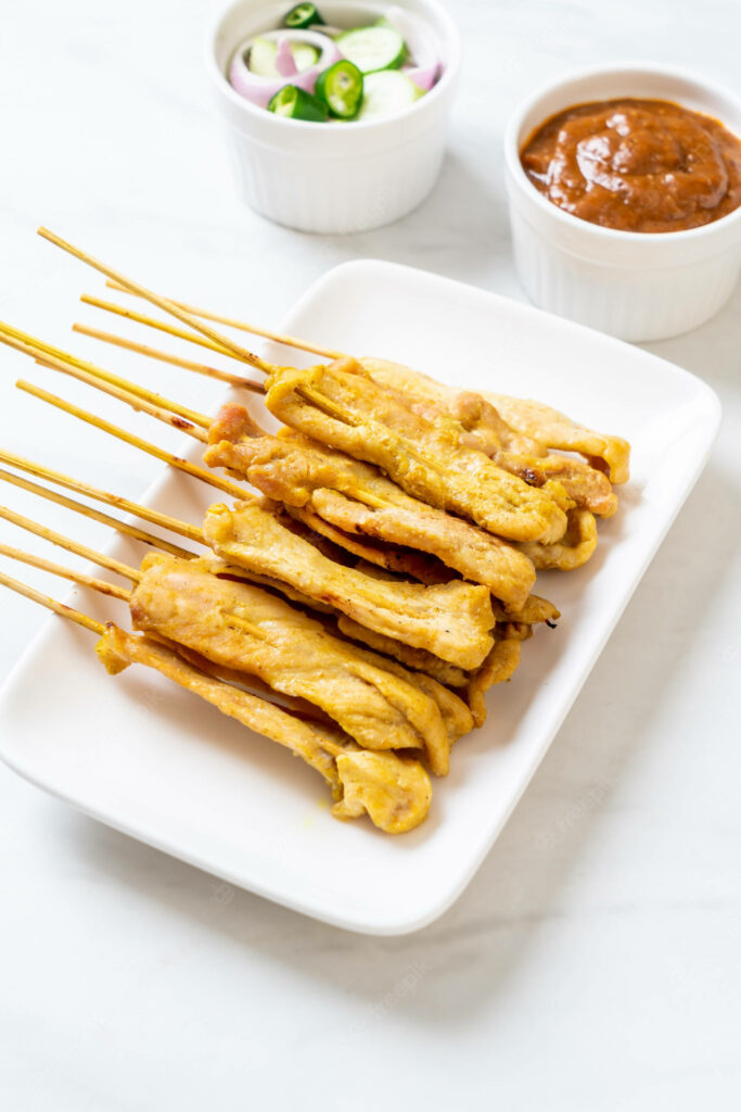 Appetizing Chicken Satay Skewers Wallpaper - Asian Cuisine Delight