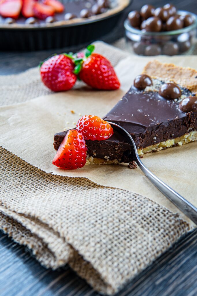 Chocolate Cake with Strawberries: Luscious Dessert Wallpaper Background