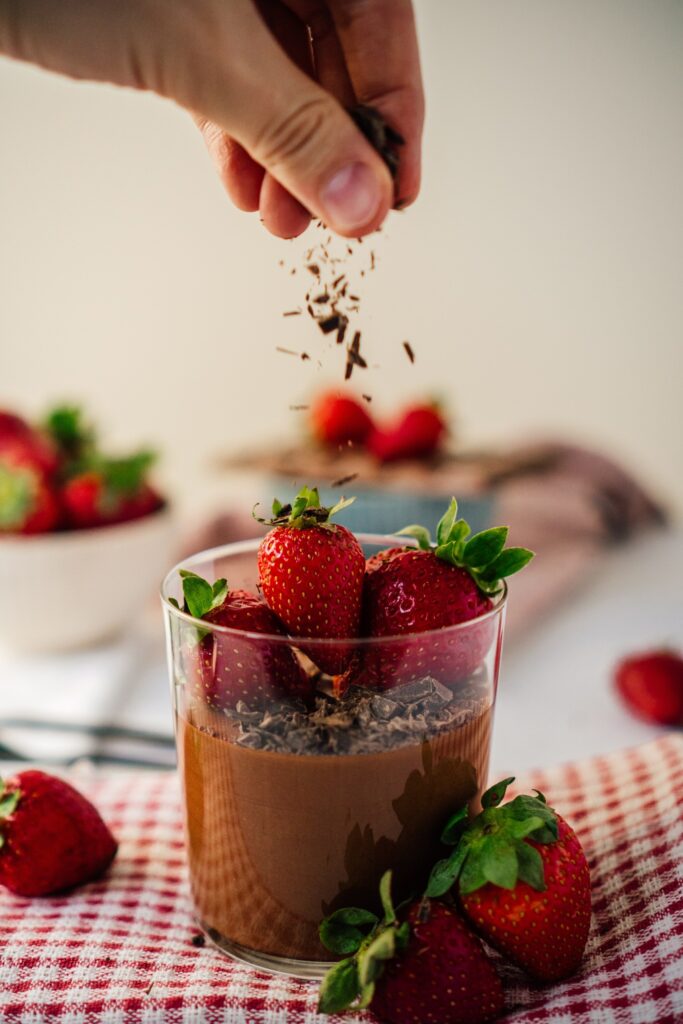 Delicious Chocolate Pudding with Fresh Strawberries - Wallpaper Delight