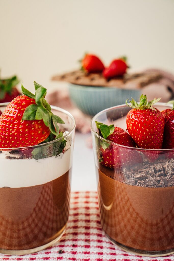 Delightful Chocolate Pudding Dessert Wallpaper with Strawberries & Cream