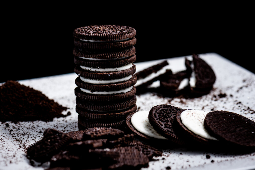 Delicious Chocolate Sandwich Cookies Close-Up | Creamy Filling Wallpaper