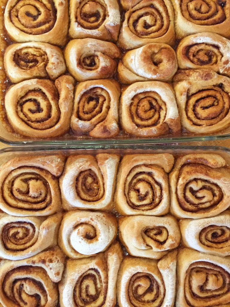 Delicious Cinnamon Rolls Wallpaper: Warm Baking Dish Background