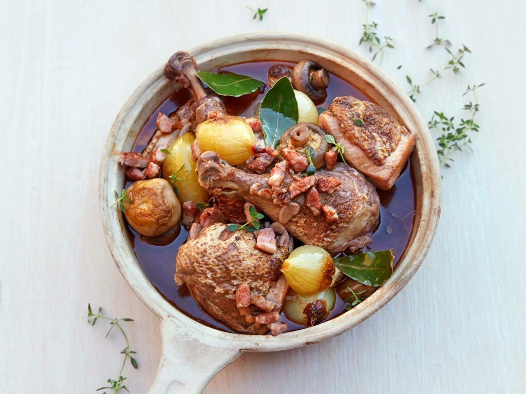 Coq Au Vin Wallpaper: Rustic French Dish in Rich Wine Sauce