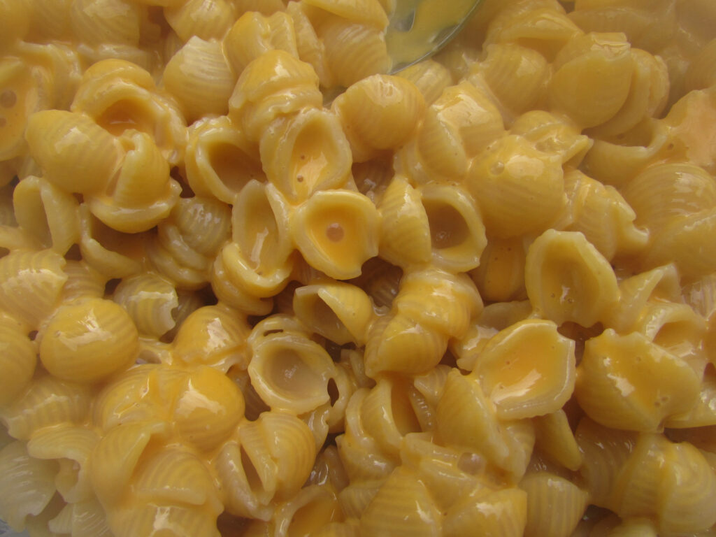 Rich Golden Mac and Cheese with Conch Pasta - Appetizing Wallpaper