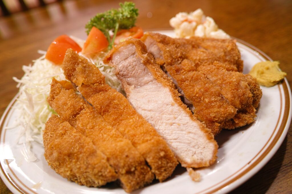 Delicious Crispy Cutlets with Salad & Cabbage Wallpaper Background