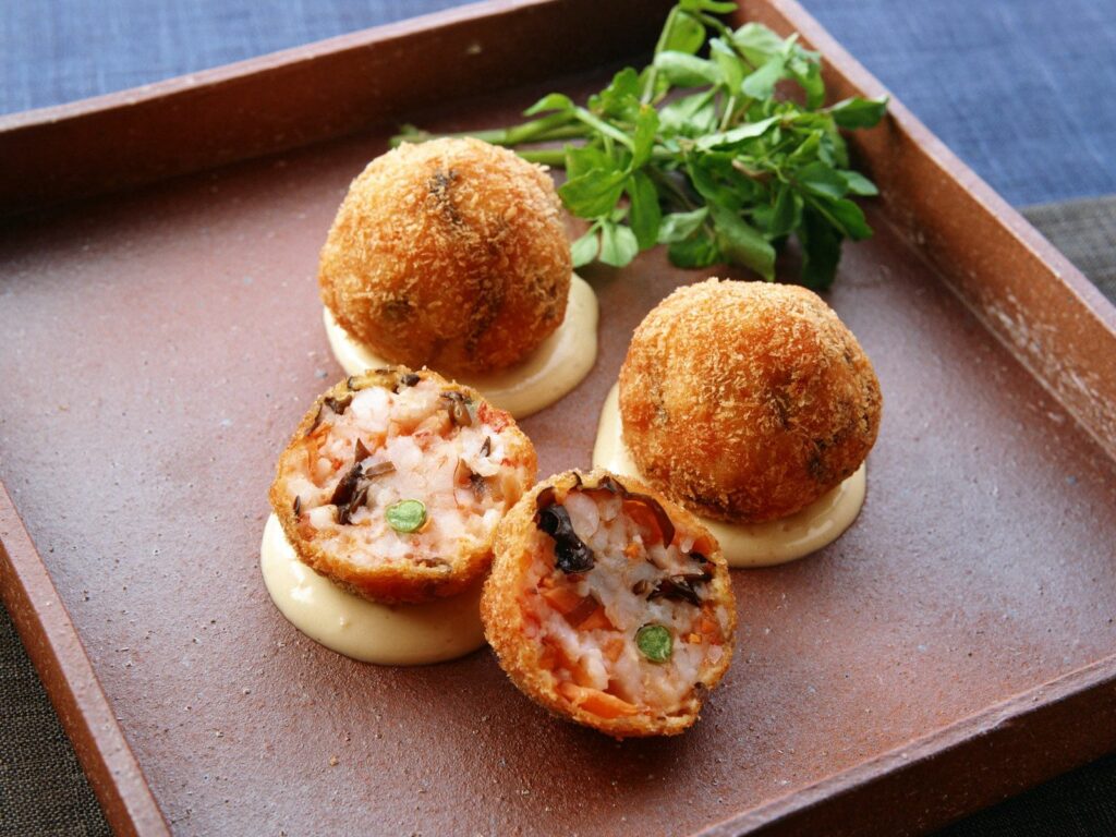 Delicious Golden Fried Balls with Vegetables & Meat - Wallpaper Background