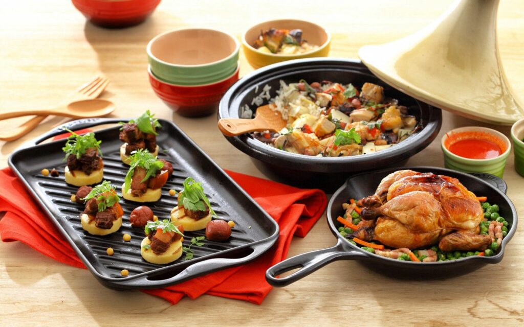 Delicious Culinary Delights Wallpaper: Roasted Chicken & Grilled Appetizers