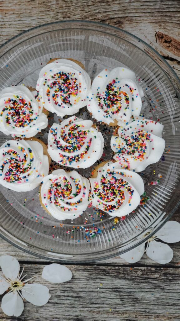 Delicious Cupcakes with Creamy Frosting & Sprinkles - Rustic Wallpaper