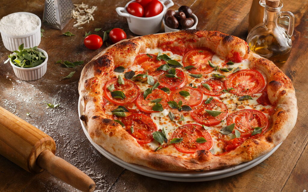 The Irresistible Delight of Authentic Italian Pizza: A Tempting Feast for Pizza Lovers Wallpaper