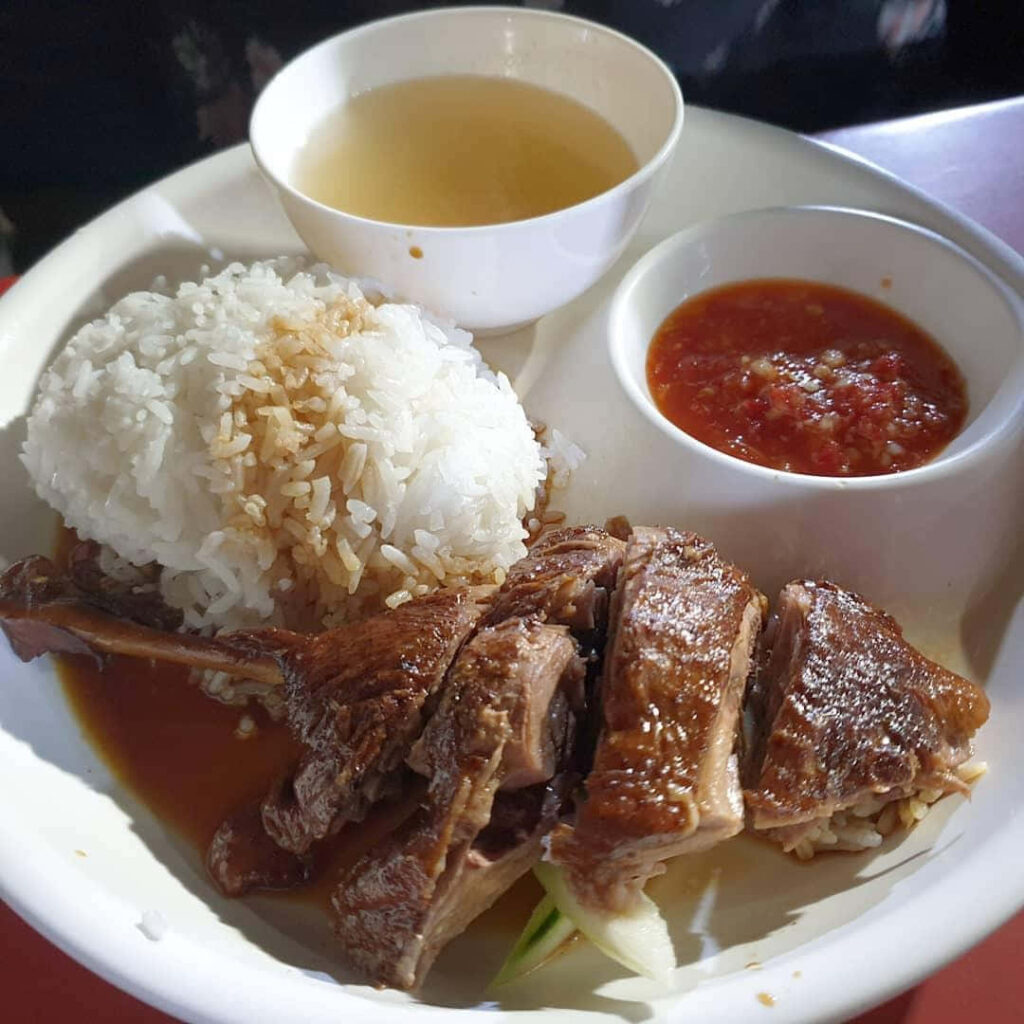 Indulge in Duck Rice at Enak Enak: Tender, Savory, and Spicy Wallpaper