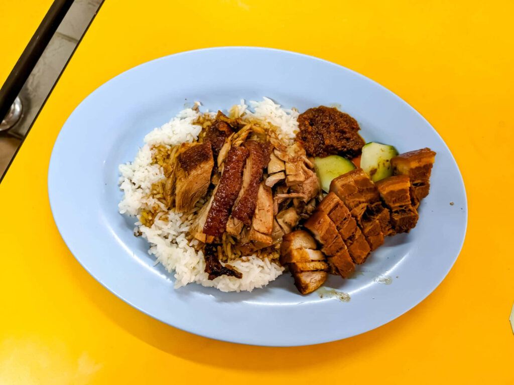 Delicious Duck Rice from Lek Kee: Tender Duck & Savory Sauces Wallpaper