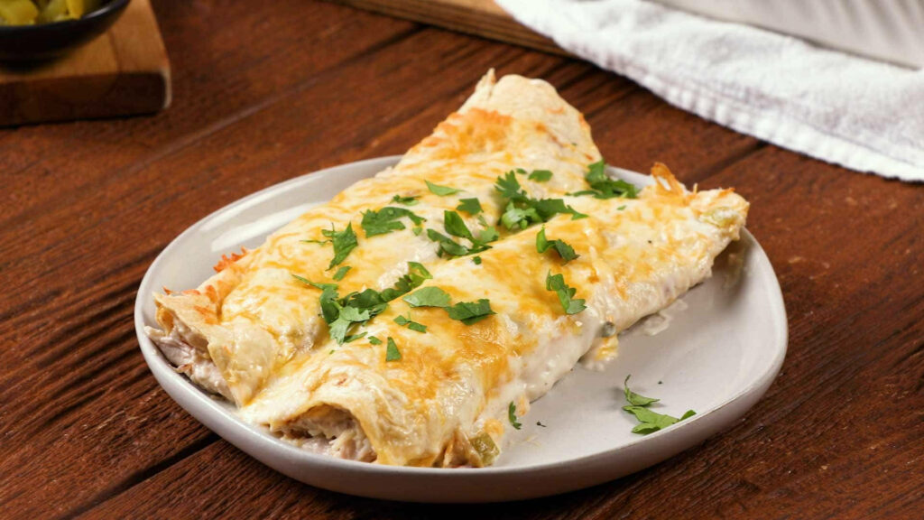 Delicious Enchiladas Wallpaper: Savory & Cheesy Delight Background