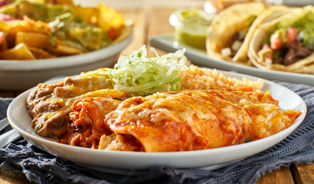Delicious Enchiladas with Cheese & Sides - Wallpaper Background