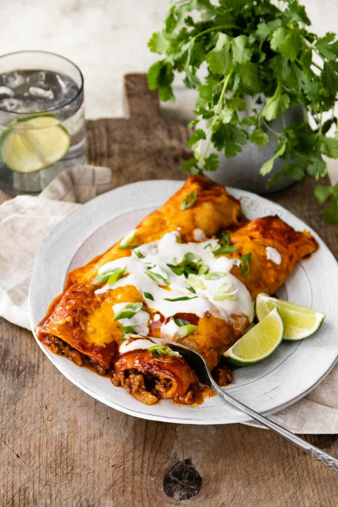 Delicious Enchiladas with Cheese & Cilantro: Rustic Table Wallpaper