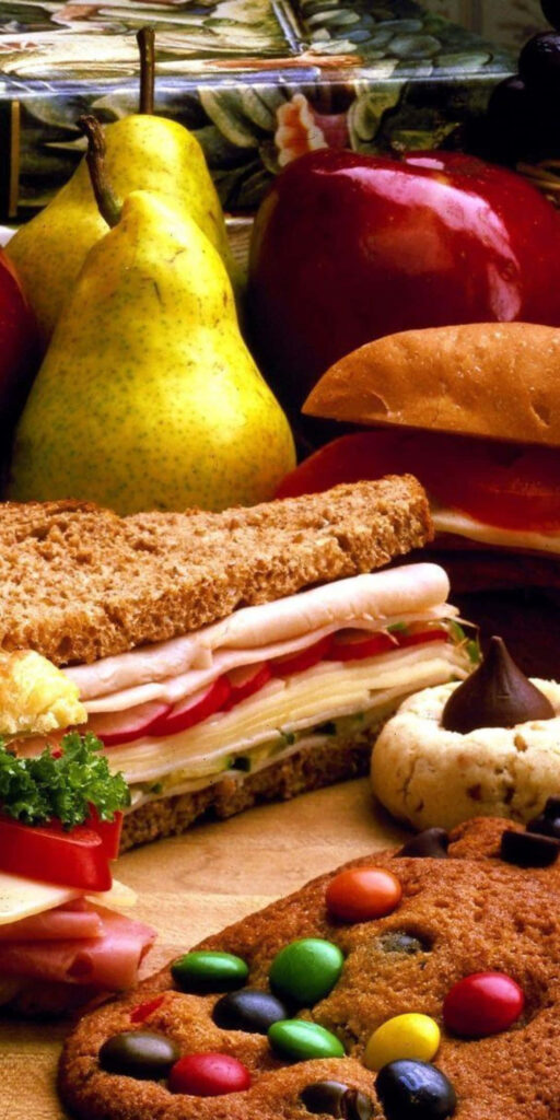 Delicious Food Wallpaper: Fresh Fruit, Sandwiches, and Cookies