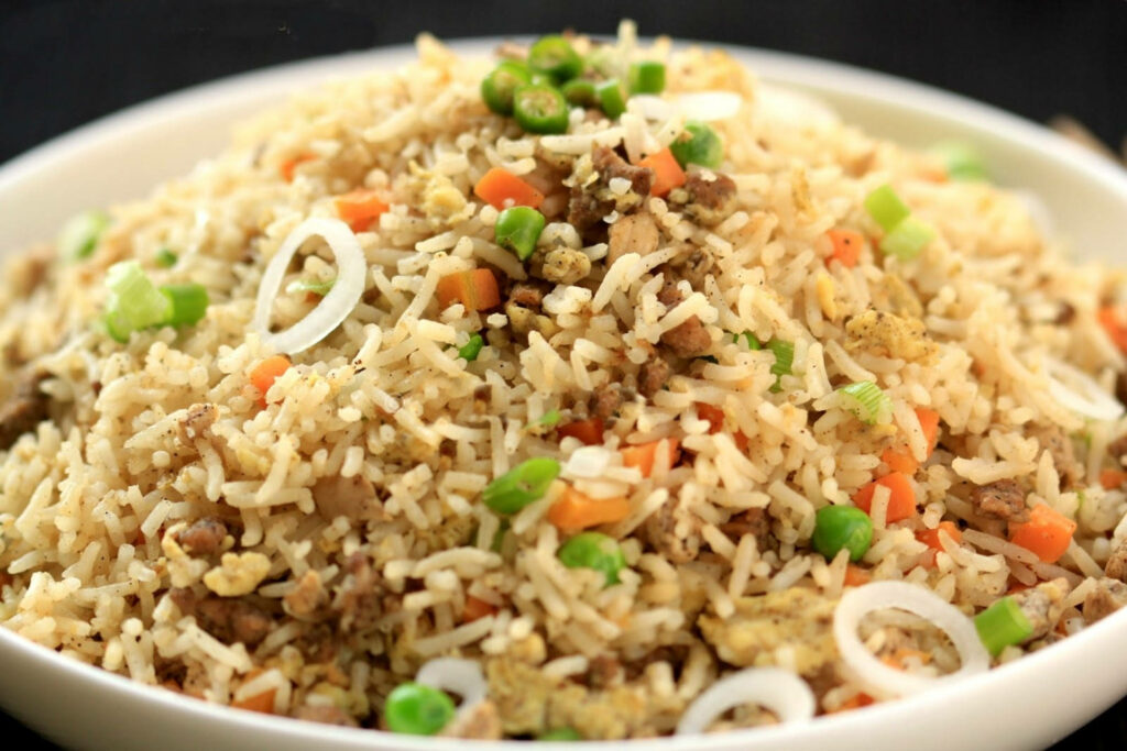 Colorful Fried Rice in White Bowl: A Flavorful Wallpaper Background