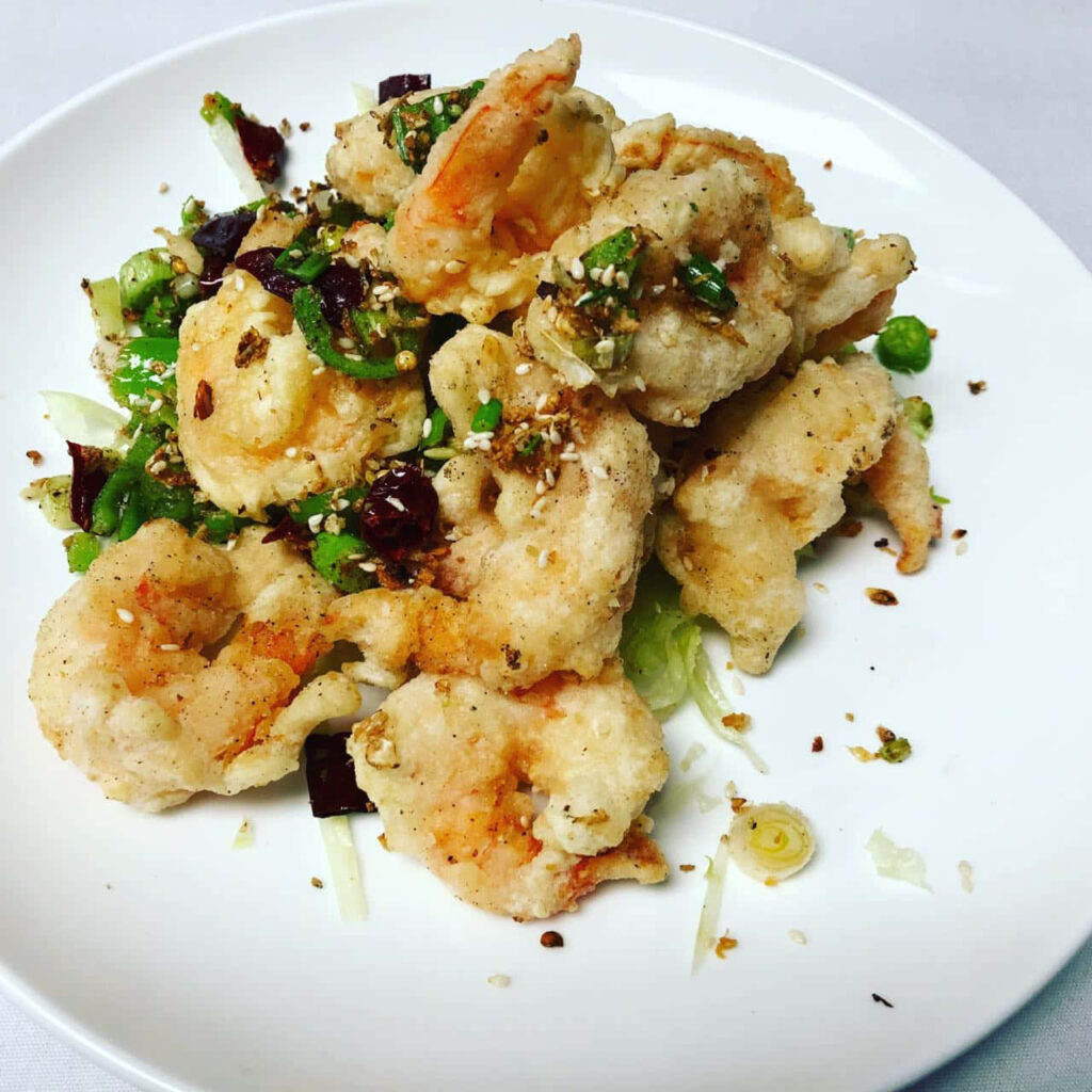 Delicious Fried Shrimp with Veggies on White Dish - Wallpaper Background