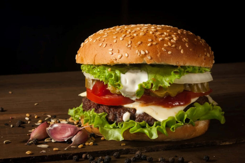 Succulent Garlic Burger with Fresh Toppings - Wallpaper Background