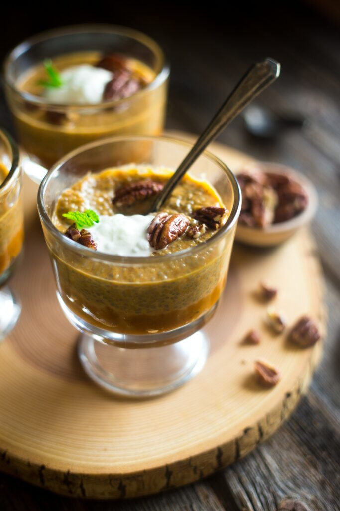 Delicious Glass Dessert: Creamy Pudding, Whipped Cream & Pecans Wallpaper