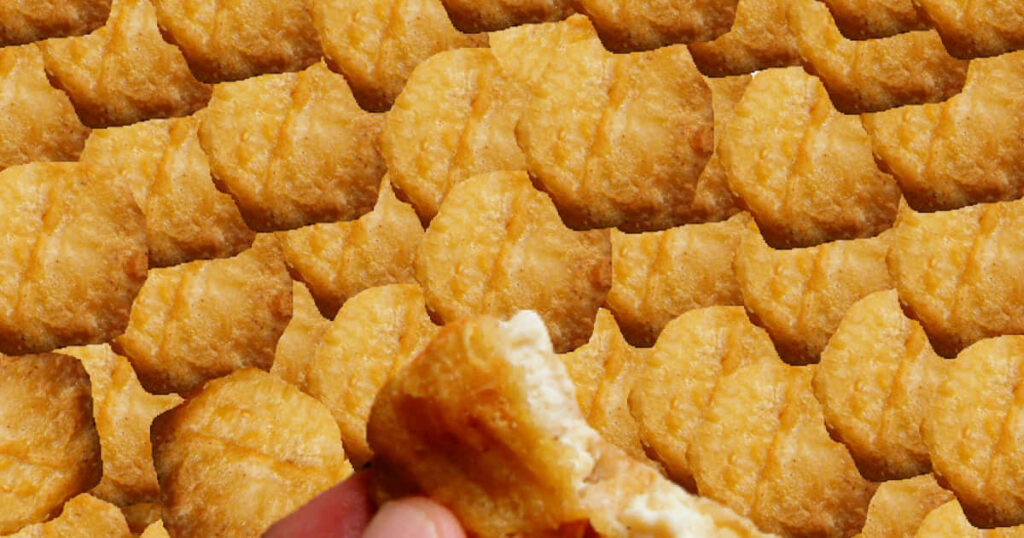 Golden-Brown Chicken Nuggets Wallpaper: Creative Seamless Design