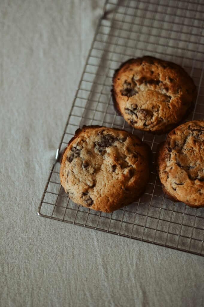 Freshly Baked Chocolate Chip Cookies on Cooling Grid Wallpaper