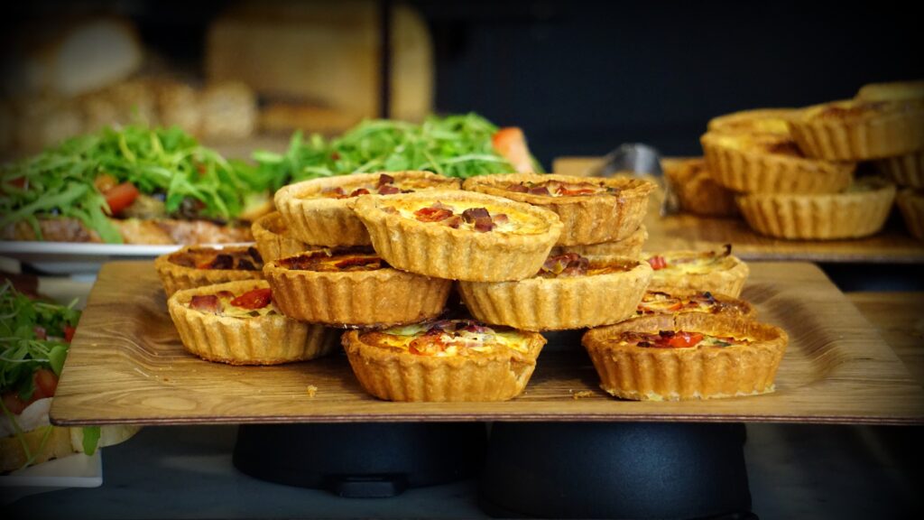Golden-Brown Pastries & Fresh Veggies: Rustic Wallpaper Background
