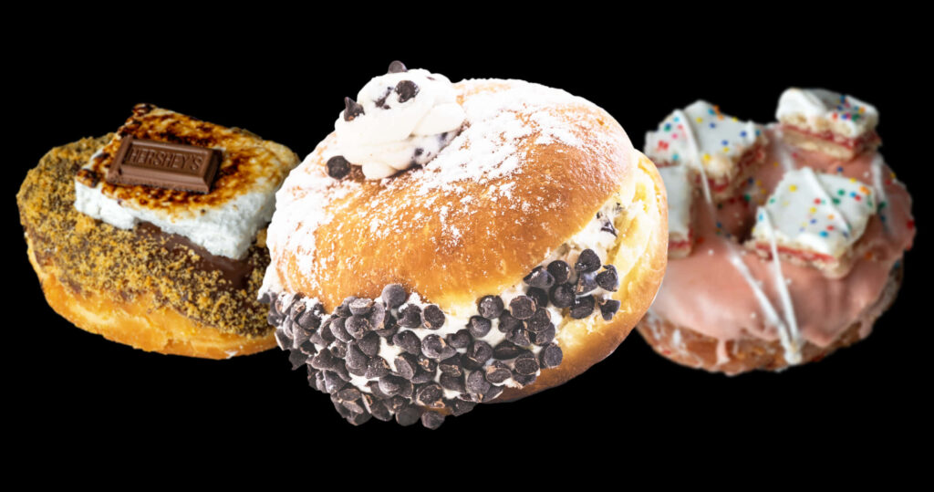 Gourmet Donuts with Unique Toppings - Festive Wallpaper Background
