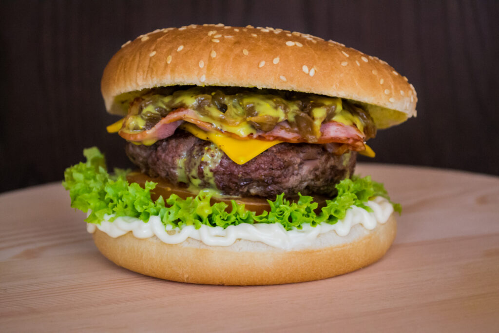 Delicious Hamburger Wallpaper: Sesame Bun, Cheese, Bacon & Veggies
