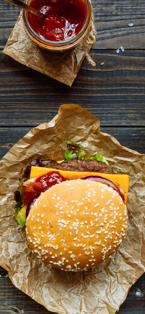 Delicious Hamburger with Ketchup, Mustard & Cheese | Wallpaper Background
