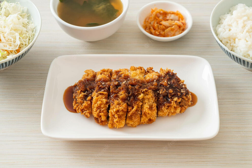 Crispy Japanese Tonkatsu Wallpaper: Perfect Meal Setting Background
