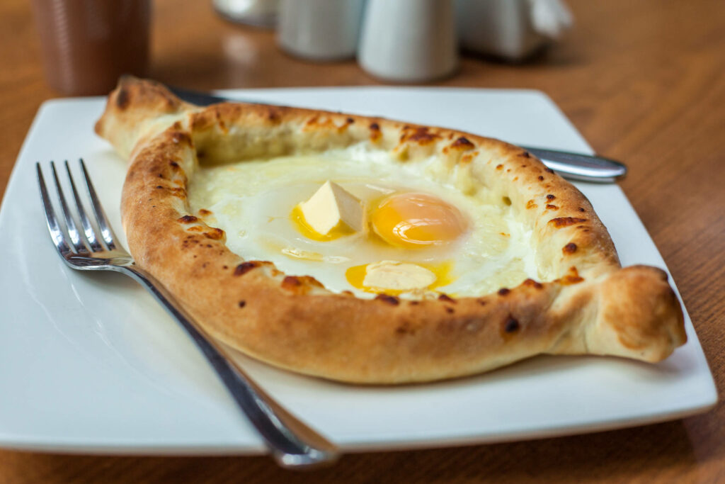 Mouthwatering Khachapuri Wallpaper: Freshly Baked with Cheese & Egg