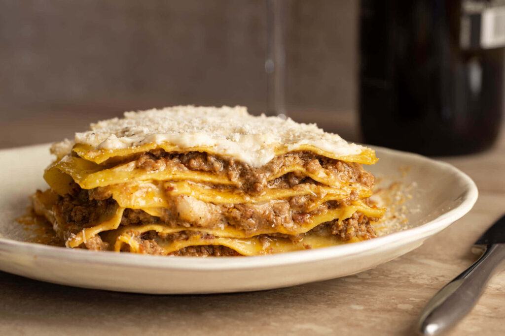 Lasagna Alla Bolognese with Parmesan - Rustic Wallpaper Background
