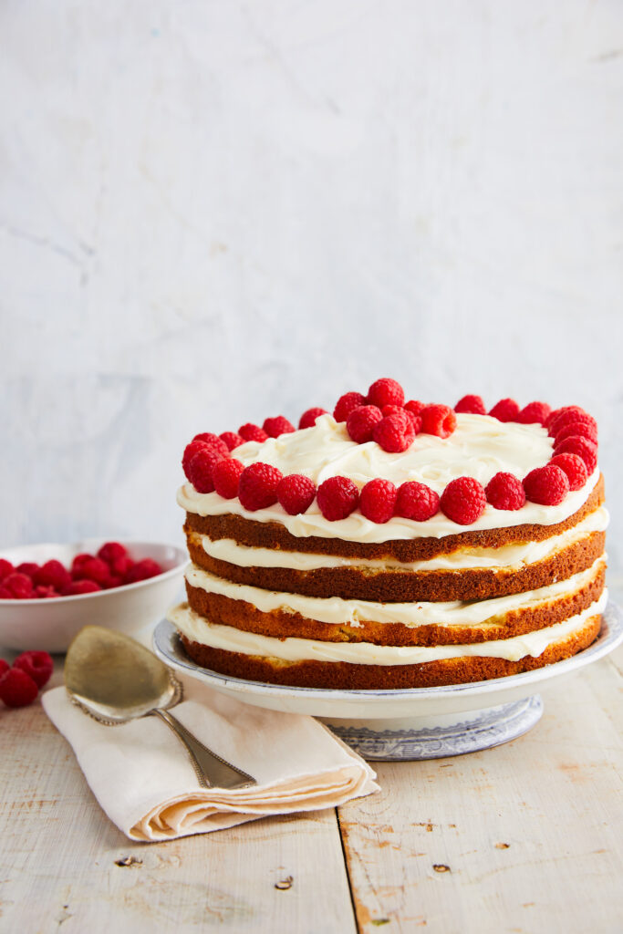 Delicious Layered Cake with Raspberries - Rustic Wallpaper Background