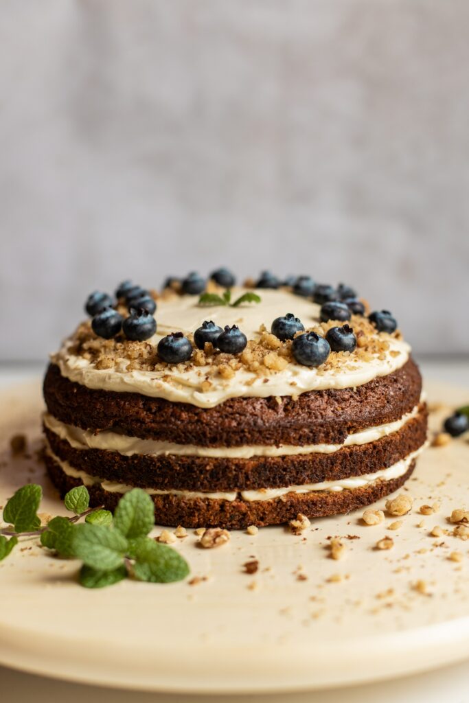 Delicious Layered Dessert Wallpaper with Blueberries & Nuts