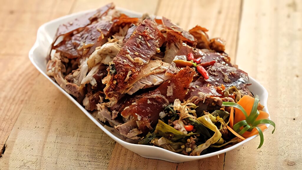 Delicious Lechon Paksiw: Tender Pork in Savory Sauce - Rustic Wallpaper