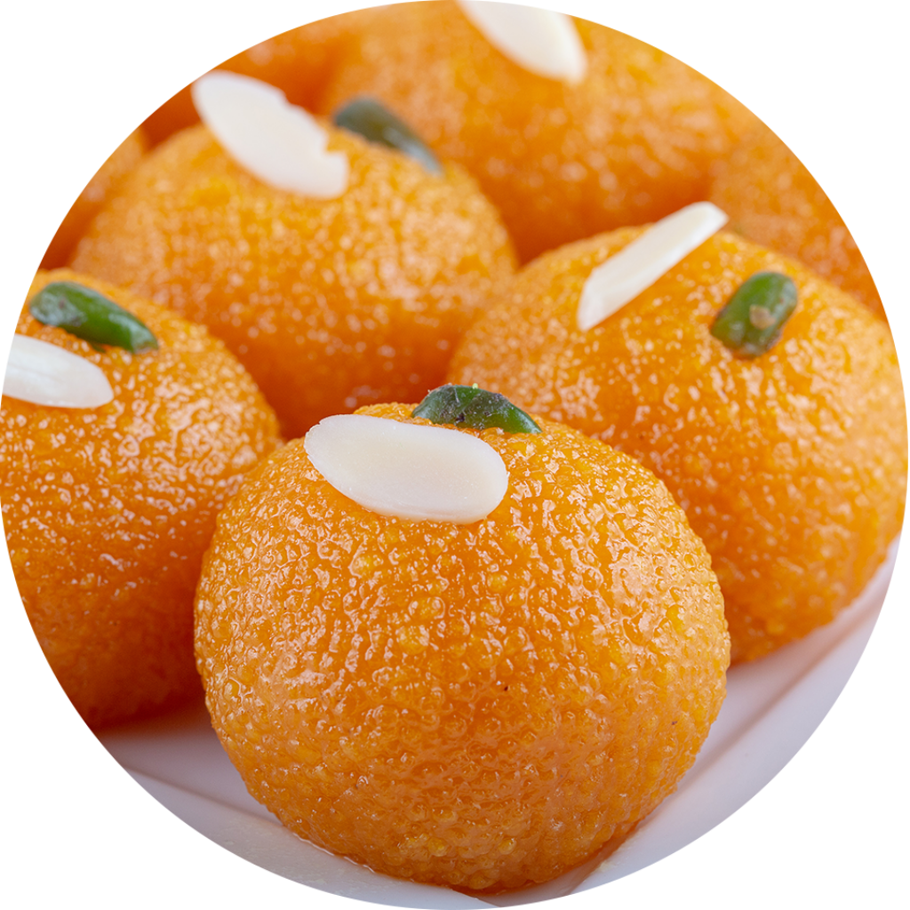 Vibrant Motichoor Ladoo Sweets: Almond & Pistachio Delight Wallpaper
