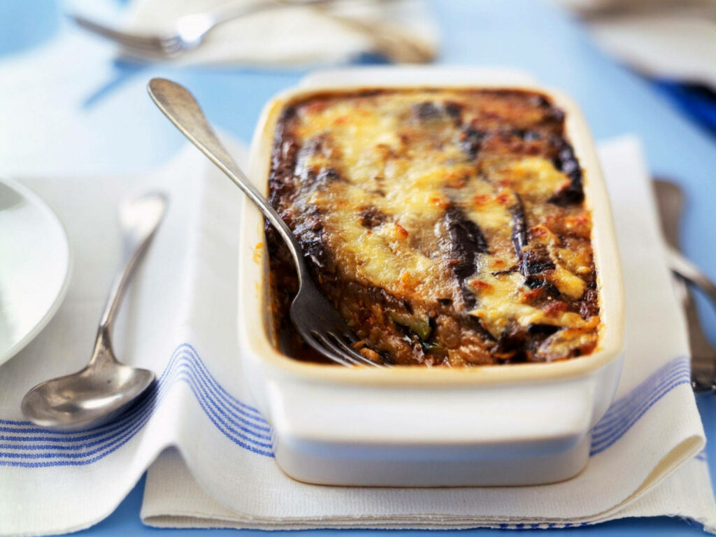 Delicious Moussaka Wallpaper: Savory Layers in Tupperware