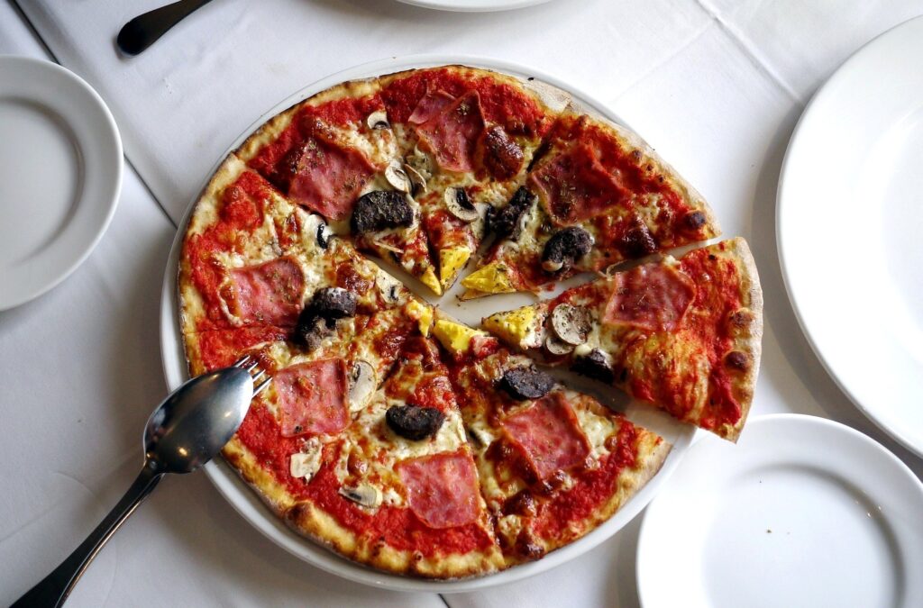Delicious Mushroom, Ham & Cheese Pizza – Dinner Table Wallpaper