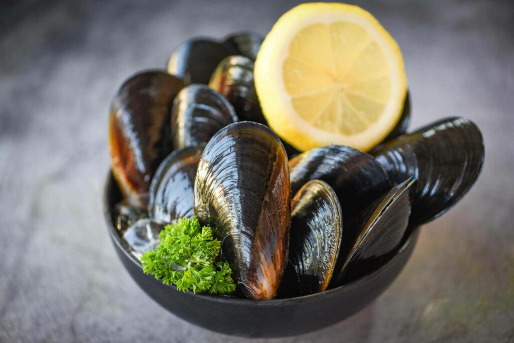 Delicious Mussels with Lemon & Parsley - Seafood Wallpaper Background