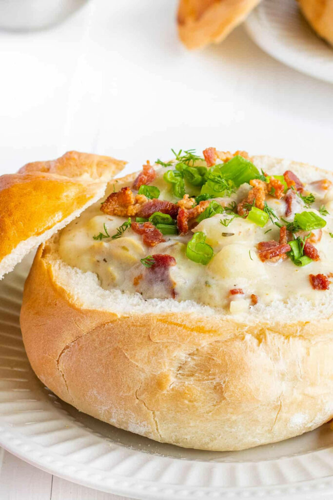 Delicious Creamy New England Clam Chowder in Bread Bowl Wallpaper