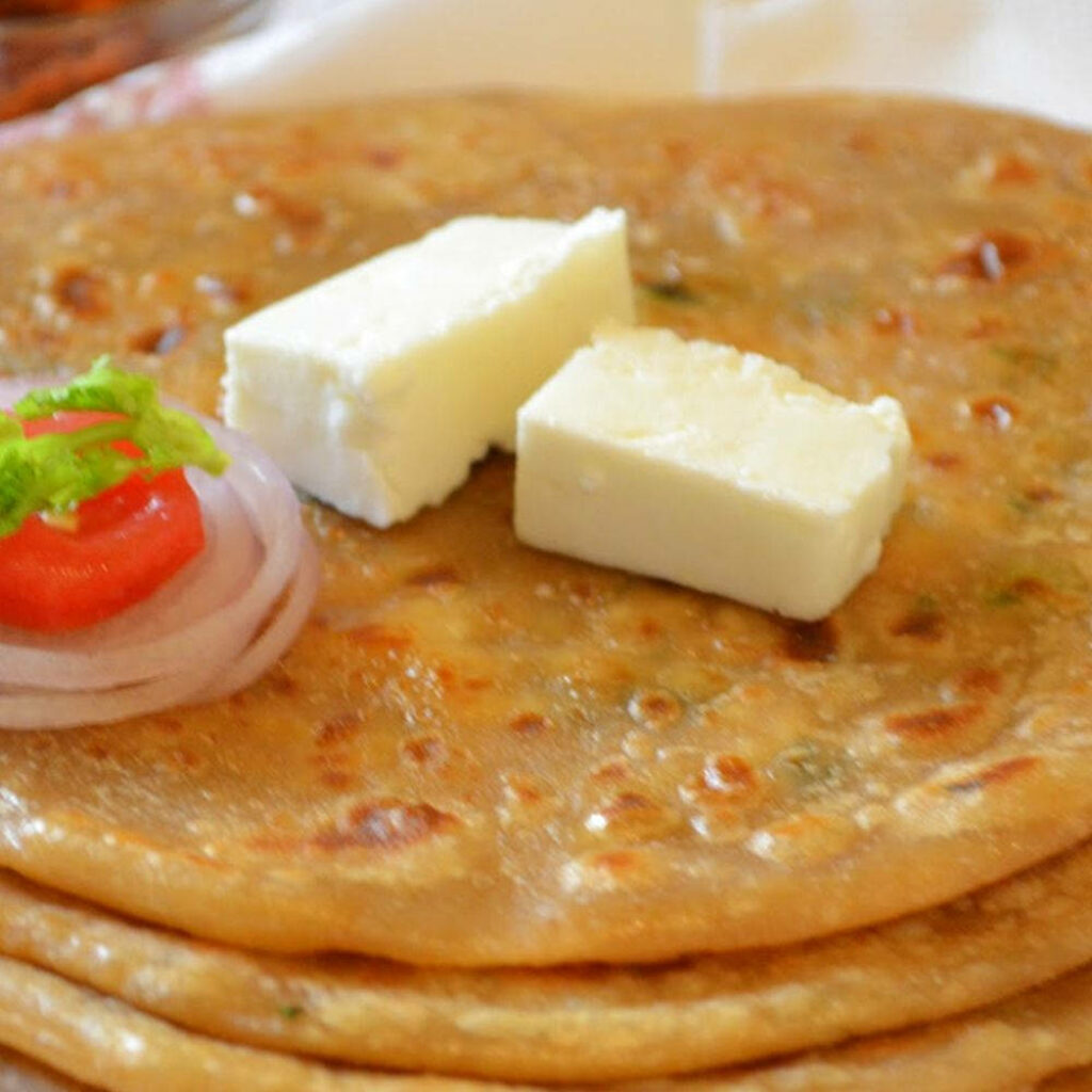 Delicious Onion Tomato Flatbread with Butter - Wallpaper Background