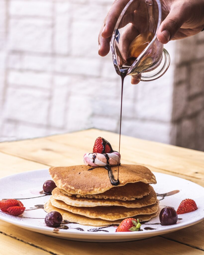 Irresistible Pancake Stack with Cream, Berries & Chocolate - Wallpaper
