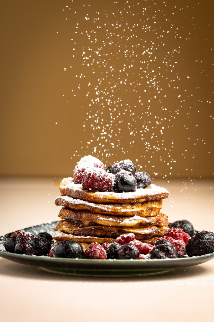 Delicious Pancakes with Berries & Powdered Sugar - Wallpaper Background