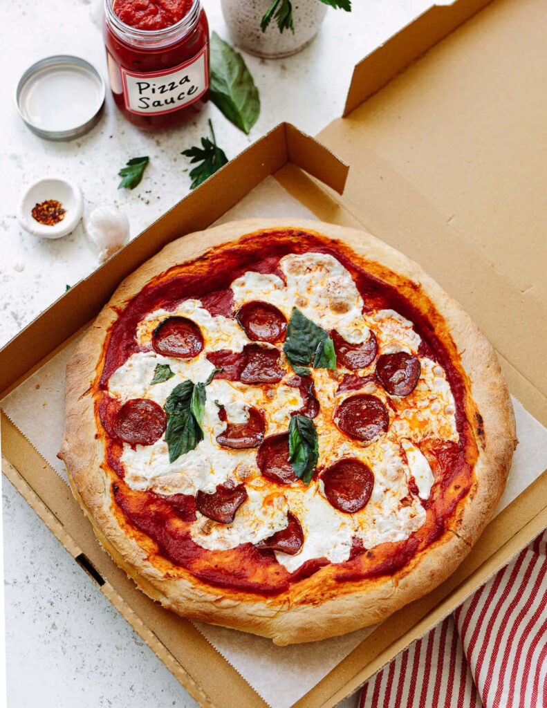 Freshly Baked Pepperoni Pizza with Cheese & Basil - Wallpaper Background