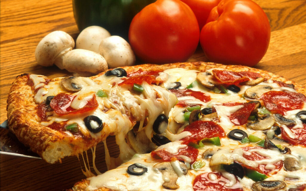 Delicious Pepperoni Supreme Pizza Wallpaper with Toppings Galore