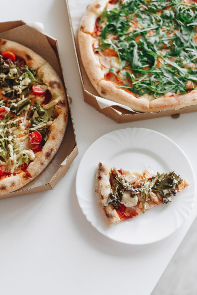 Delicious Pizza Wallpaper: Fresh Slices & Vibrant Toppings
