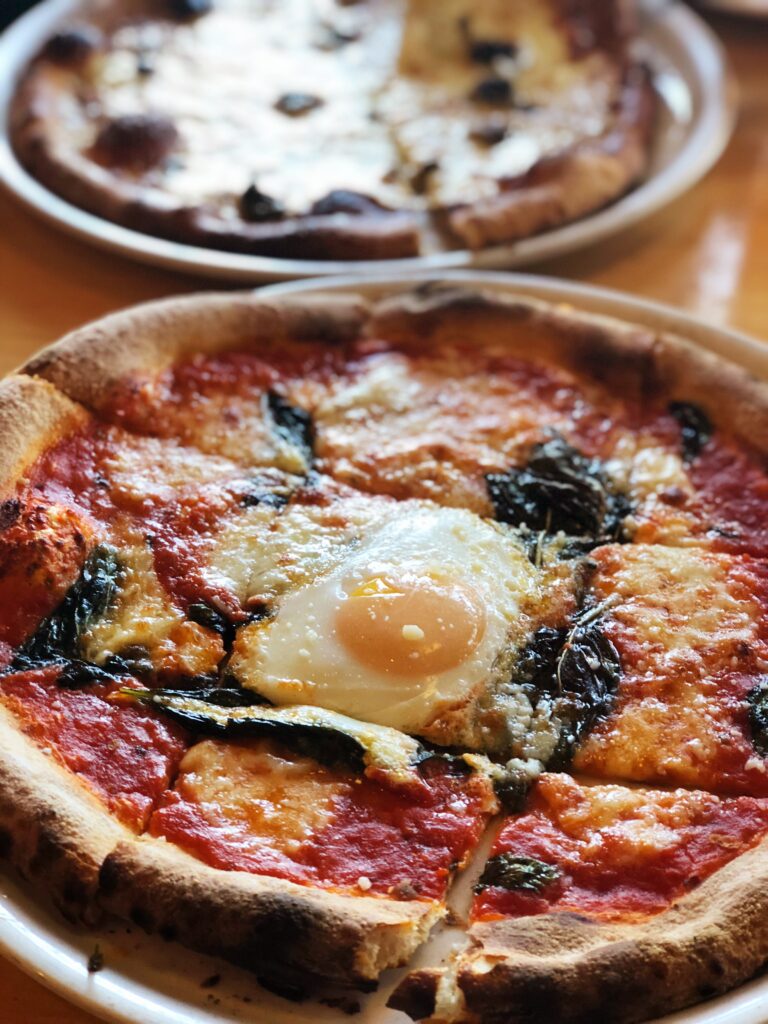 Delicious Pizza with Fresh Ingredients & Egg - Warm Kitchen Wallpaper