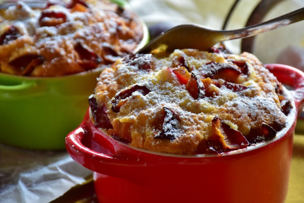 Delicious Plum Cake with Powdered Sugar - Colorful Wallpaper Delight