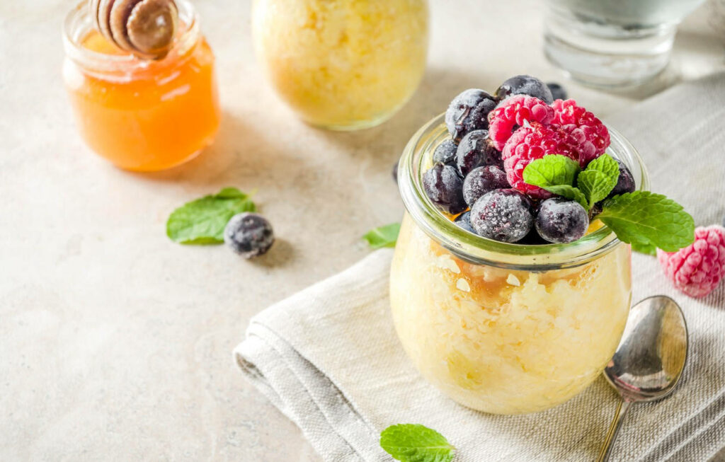 Delicious Creamy Polenta Dessert Wallpaper with Fresh Berries & Honey